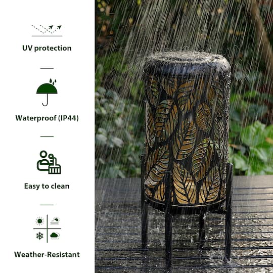 Glitzhome® 14.25" Black Metal Cutout Leaves Pattern Solar Powered LED Outdoor Lantern, 2ct.